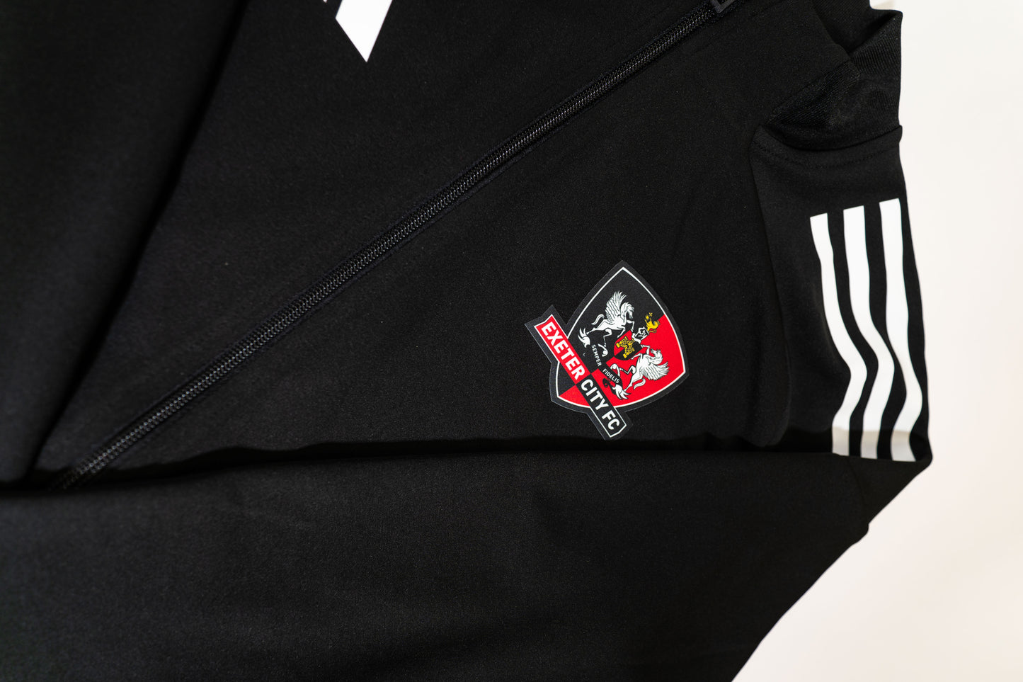 Exeter City 25/26 Full Zip Adults Warm-up Top